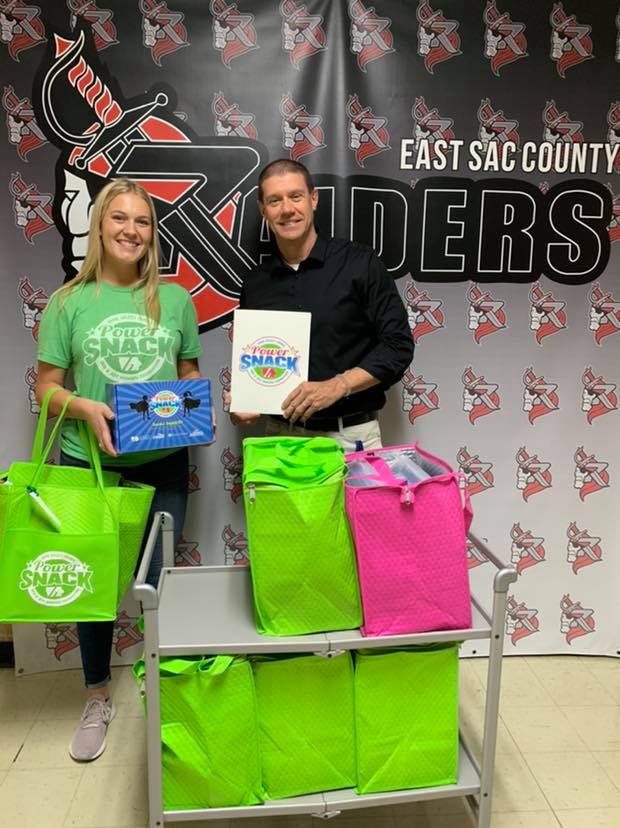 Principal holds power snack materials