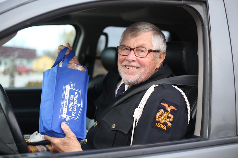 Veteran smiles with pork loin.