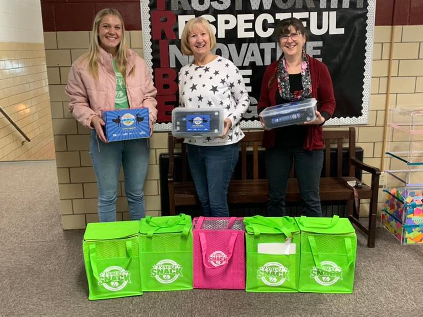 Eleanor delivers Power Snack materials to Clarke school admin