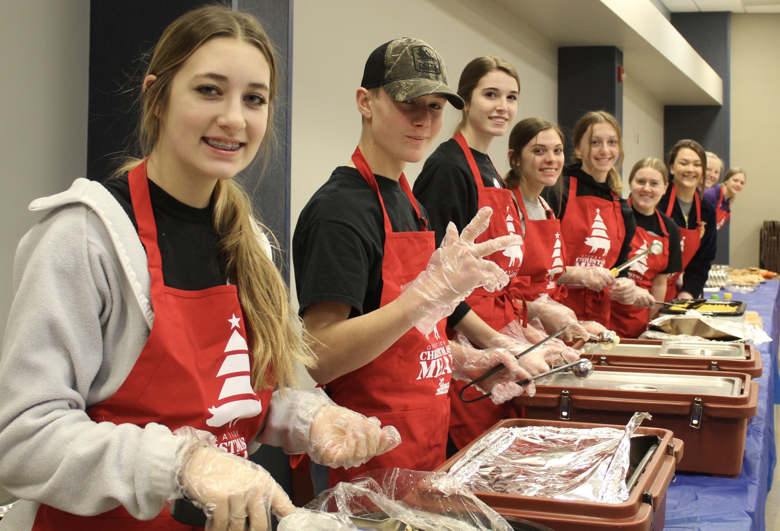 students serve food