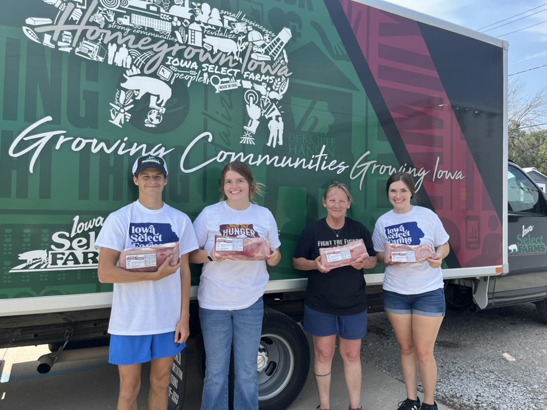 delivery team in front of box truck