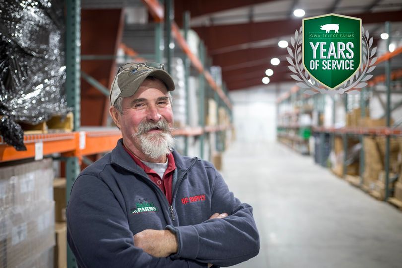 Monty standing in the Osceola warehouse