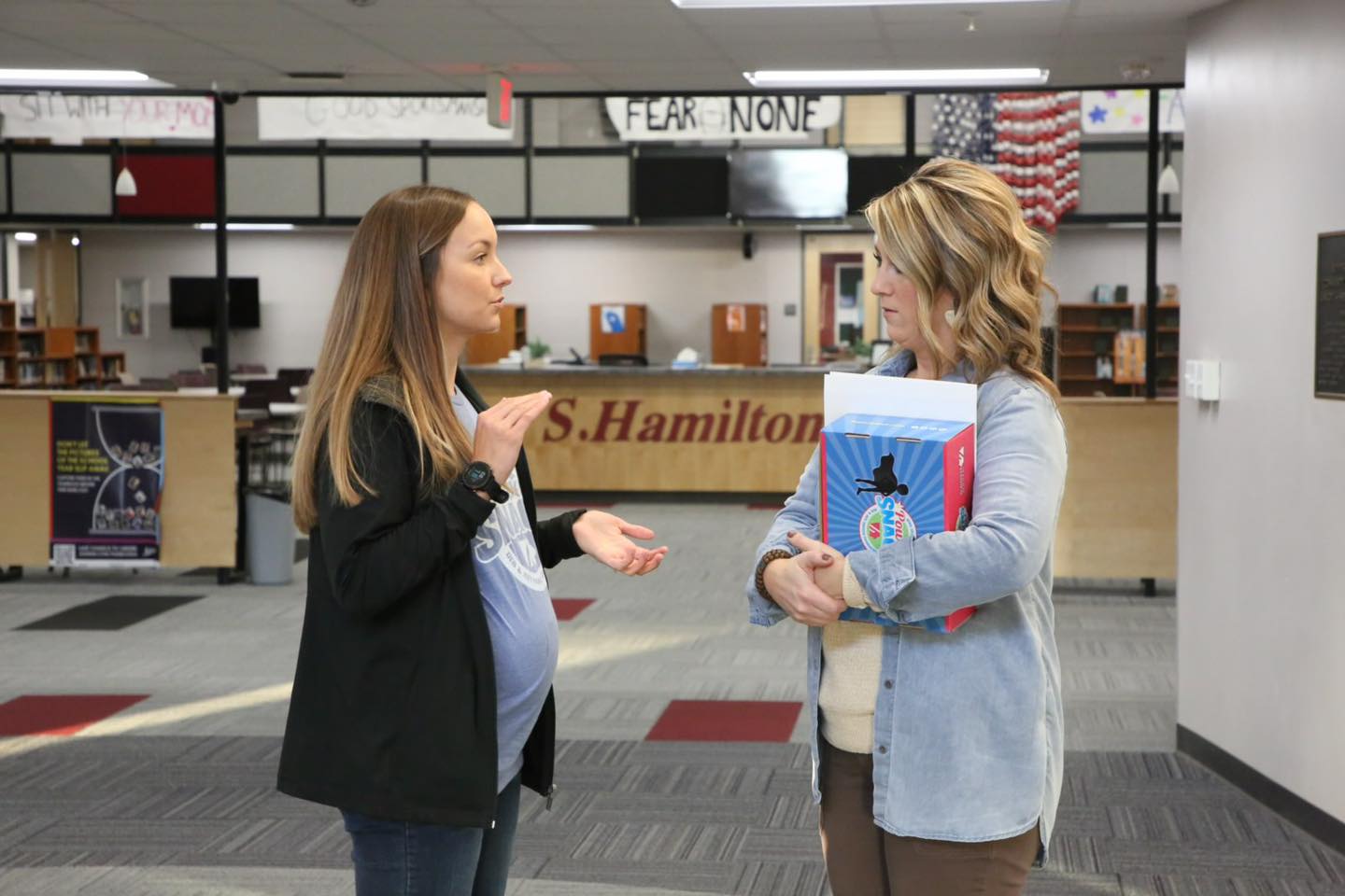 Madi explaining PS to Heather