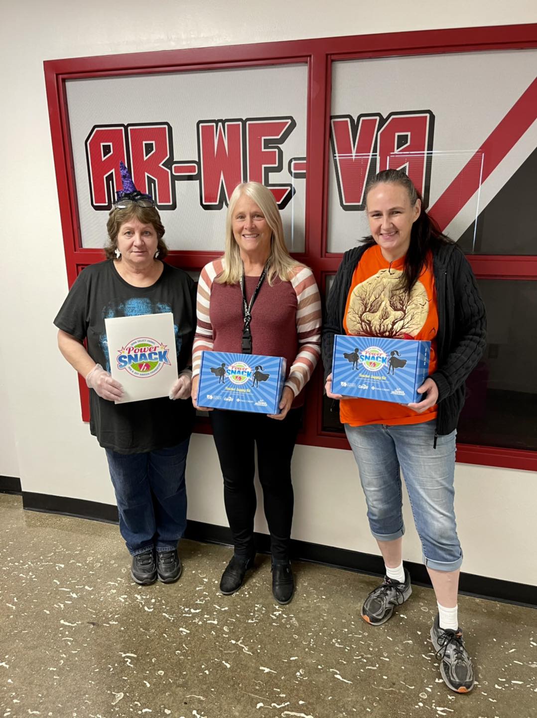 Ar-We-Va Staff holding PowerSnack items