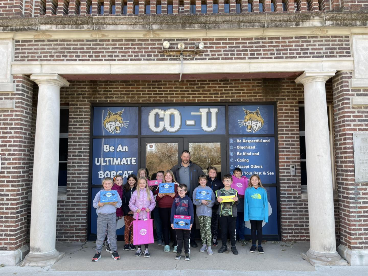 Co-U School with teacher and students