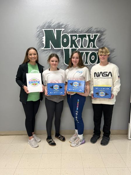 Madison and students at NU with PS coupons