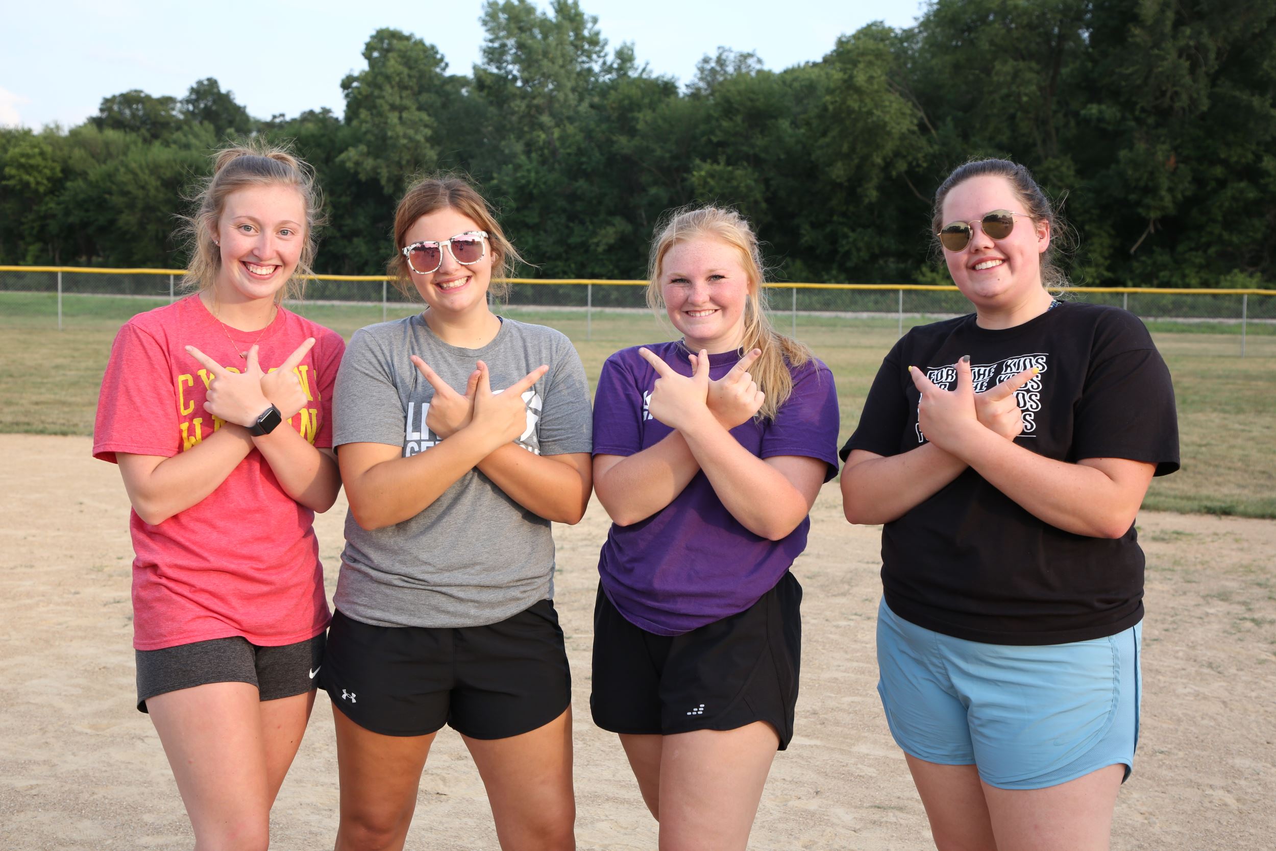 Four interns pose after the conclusion of the game.