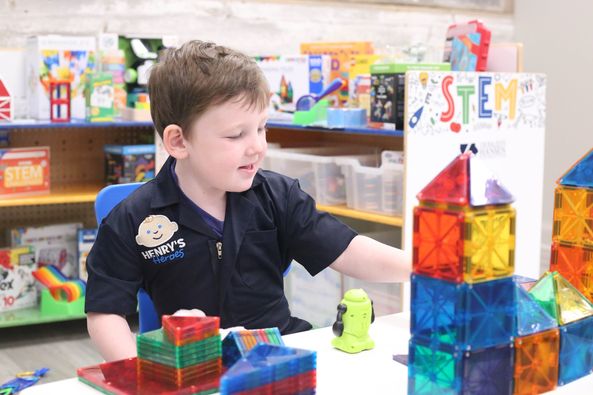 Henry playing with STEM