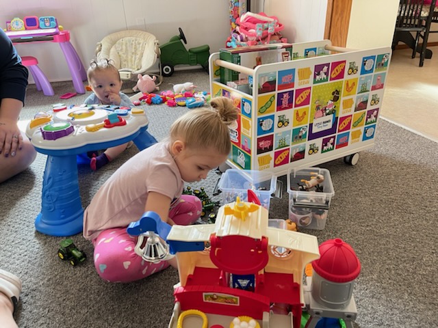 child plays with toys