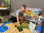 Lori's Home Day Care in Osage Enjoys Little Farmer Toy Box