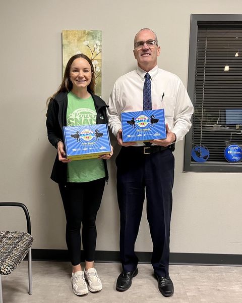 Madi at WSR HS with the principal