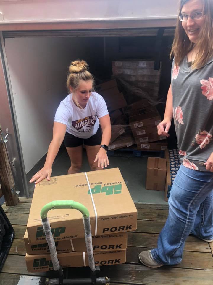 Unloading pork loins