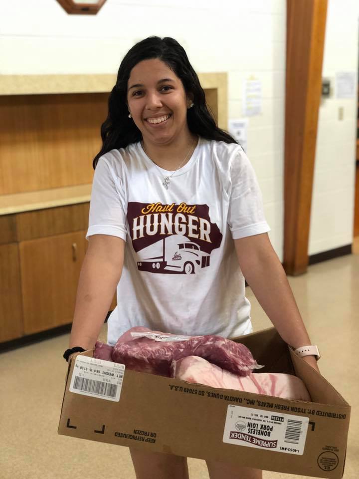 AJ hauling in pork loins