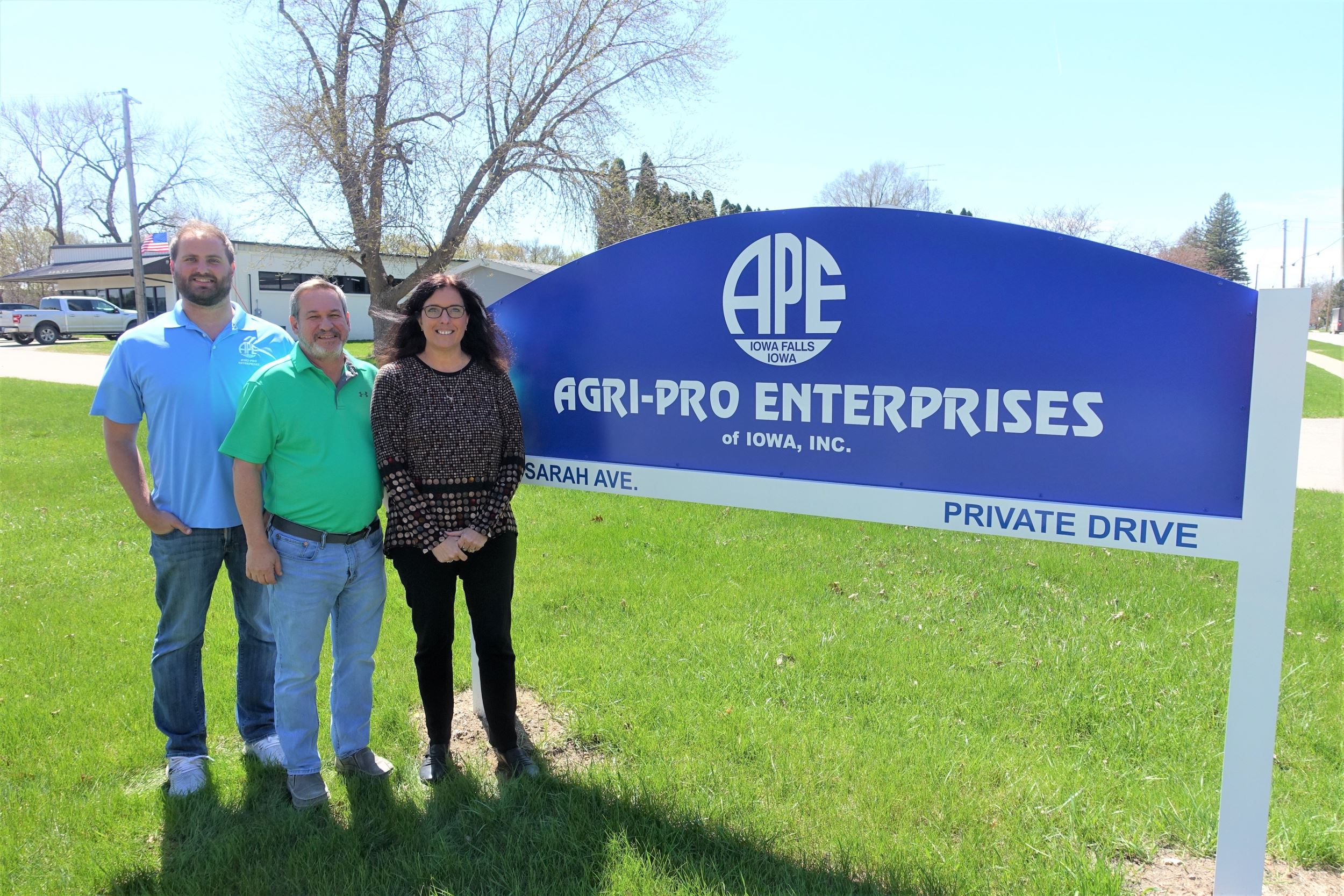 Matt, Joe, and Lari in front of Agri-Pro Enterprises