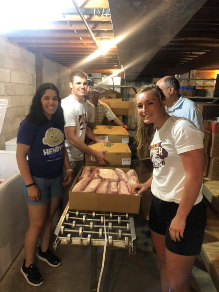 With so much help, unloading many cases of pork loins is a breeze!