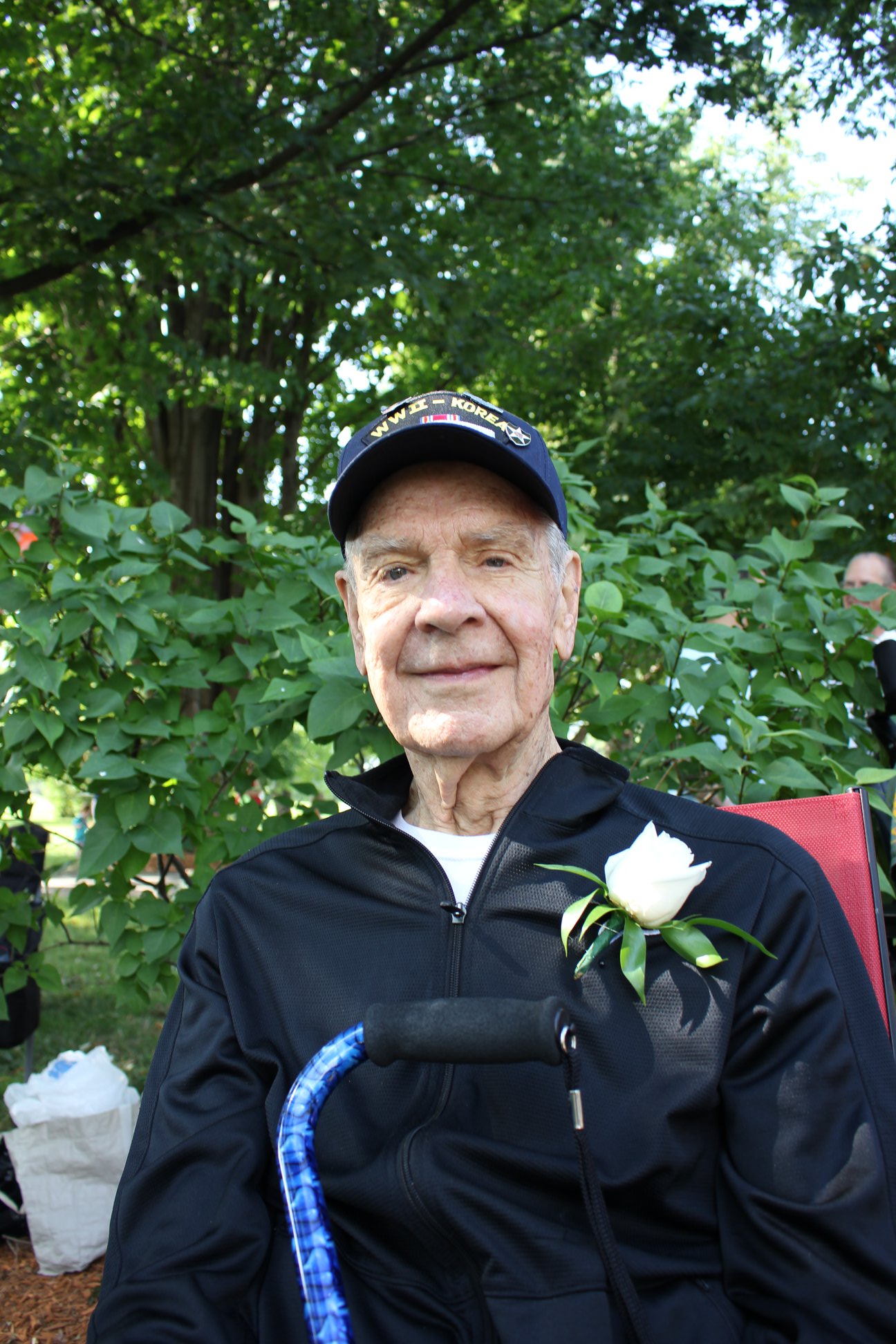 Pictured with a boutonniere