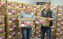 Light Company Assembles 12,000 Pork Care Packages