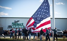 American Legion Post 69 in Osceola Helps Hoist Flags at the New Iowa Select Farms Warehouse and Conference Center